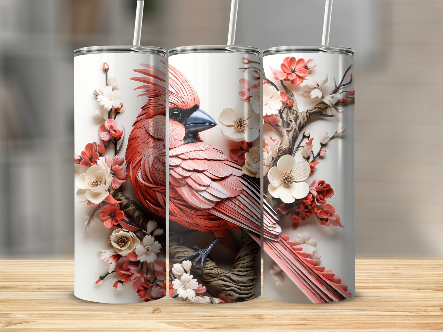 Three tumblers with a cardinal and floral design.