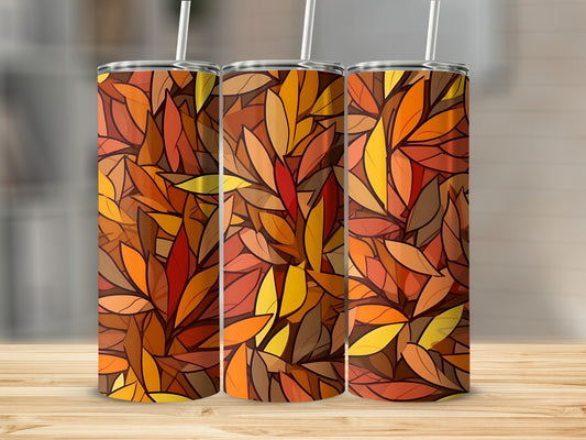 Three tumblers with a pattern of autumn leaves in shades of red, orange, and yellow.