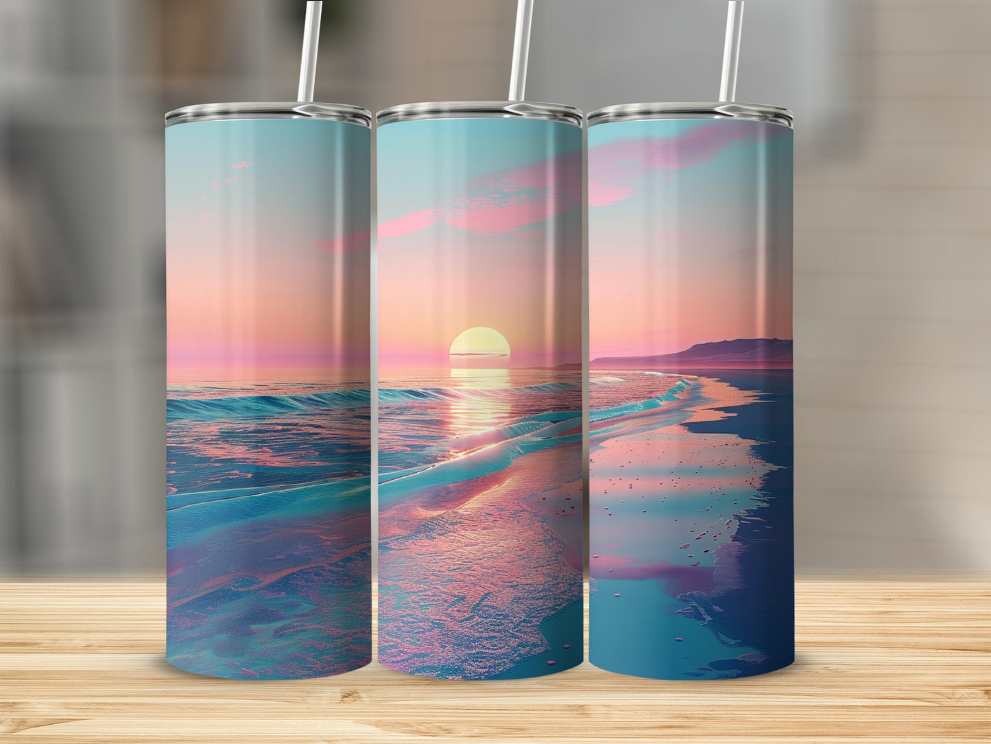 Three tumblers showing a sunset over a calm ocean beach.