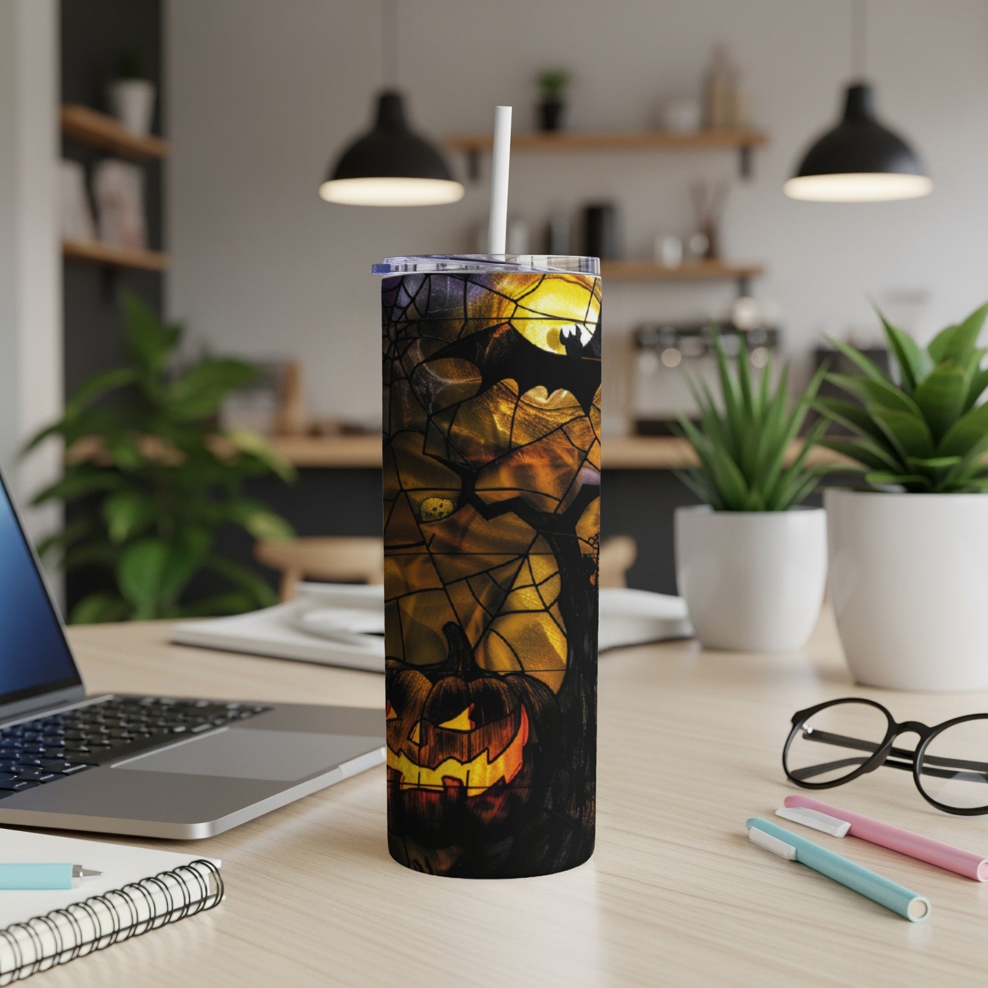 Spooky Halloween tumbler with jack-o'-lantern and cobweb design.