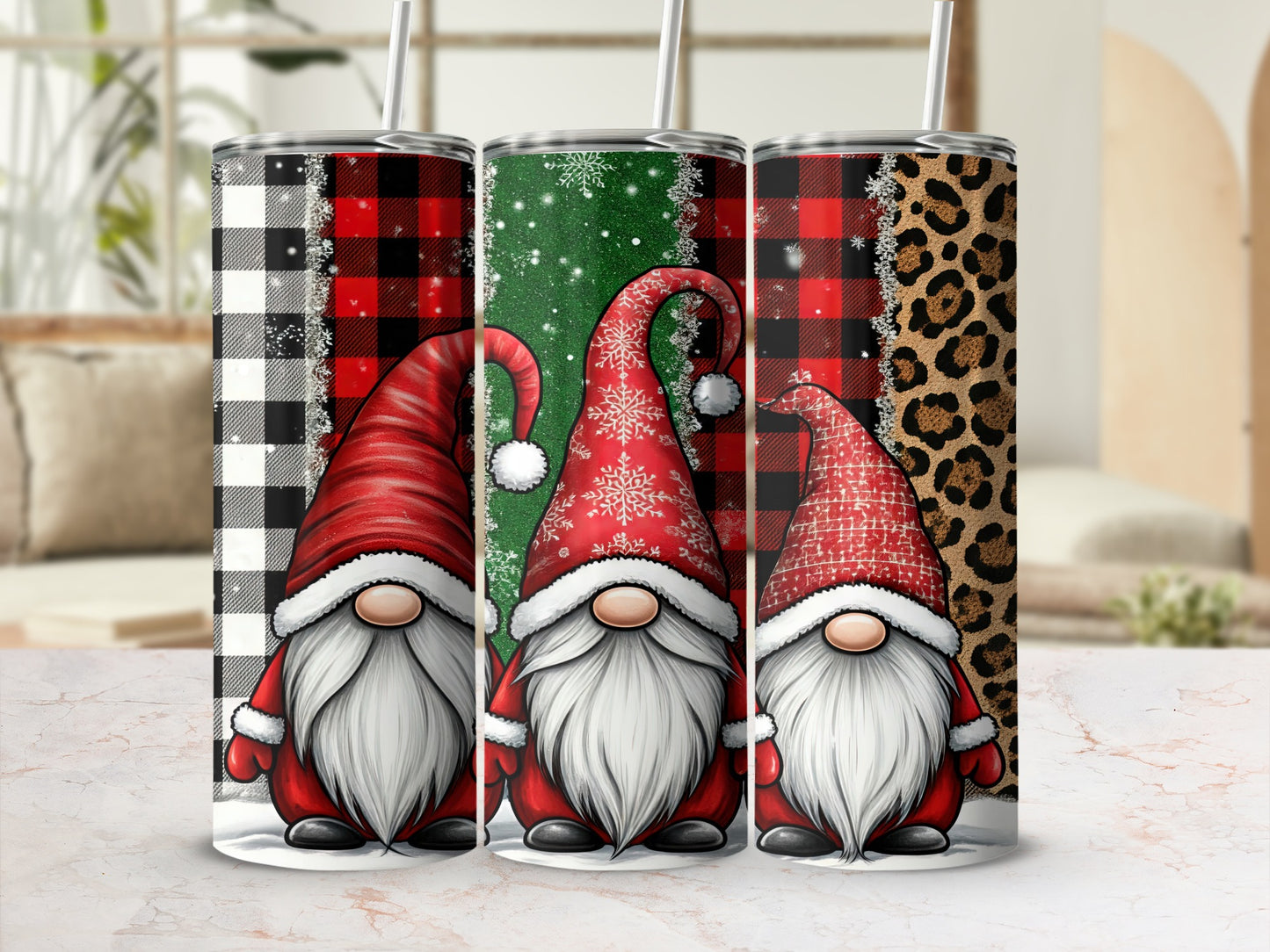 Three Christmas gnomes in patterned tumblers with red hats and beards.