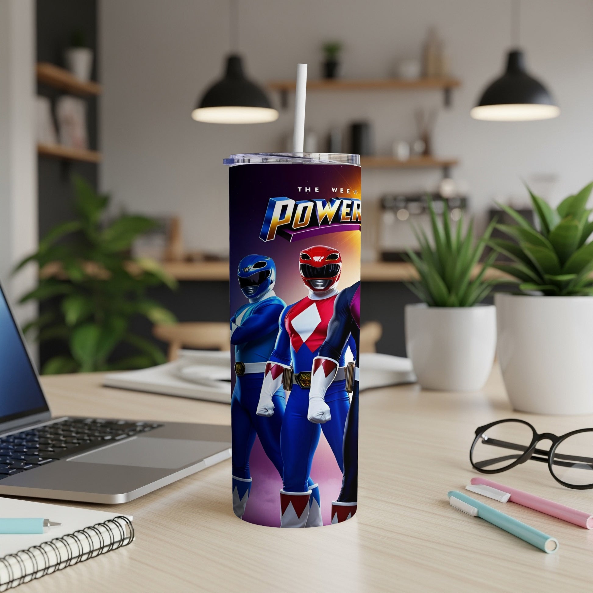 Three Power Rangers stand side by side on a purple tumbler.
