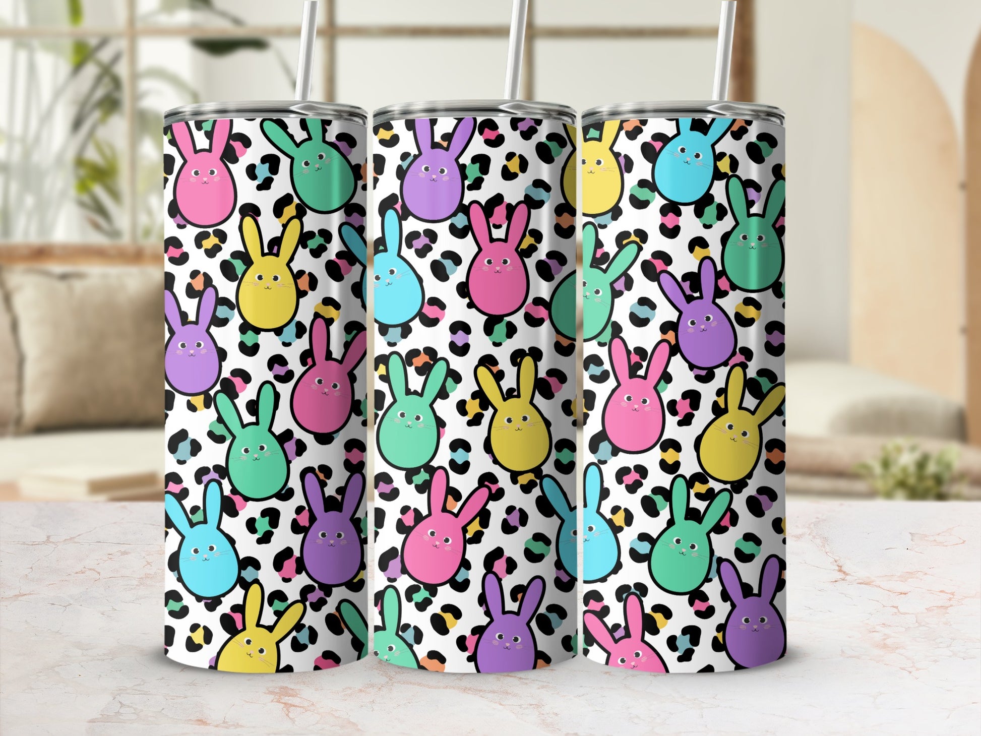 Colorful bunnies with leopard print pattern on a tumbler.