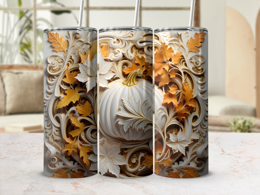 White pumpkin and autumn leaves adorn three decorative tumblers.