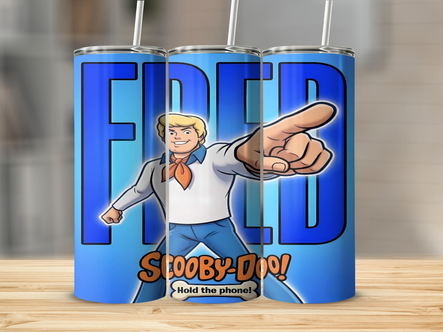 Fred from Scooby-Doo points with "Hold the phone!" text.