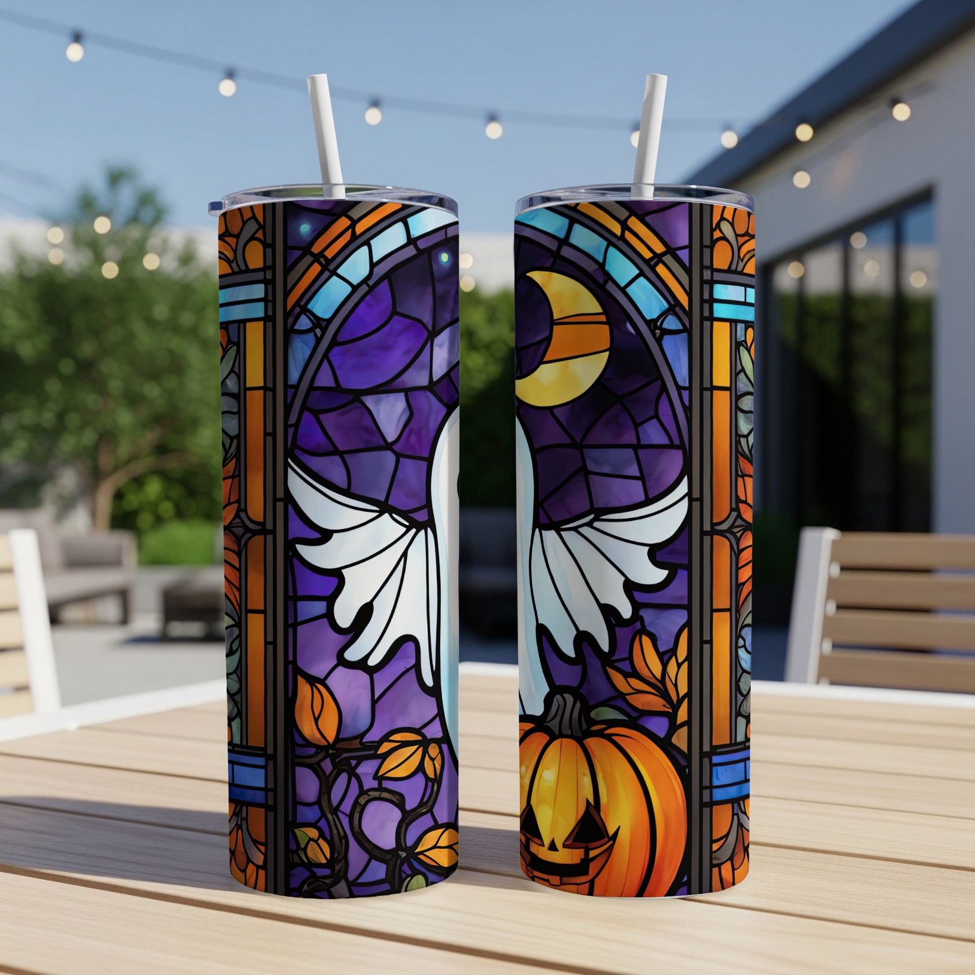 Two tumblers with Halloween stained glass designs featuring a ghost and a jack-o'-lantern.