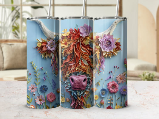 Highland cow with colorful flowers and foliage on a blue background.