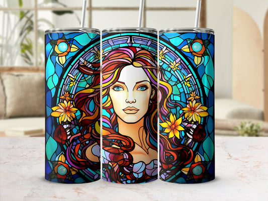 Stained glass tumbler with woman's portrait and floral accents.