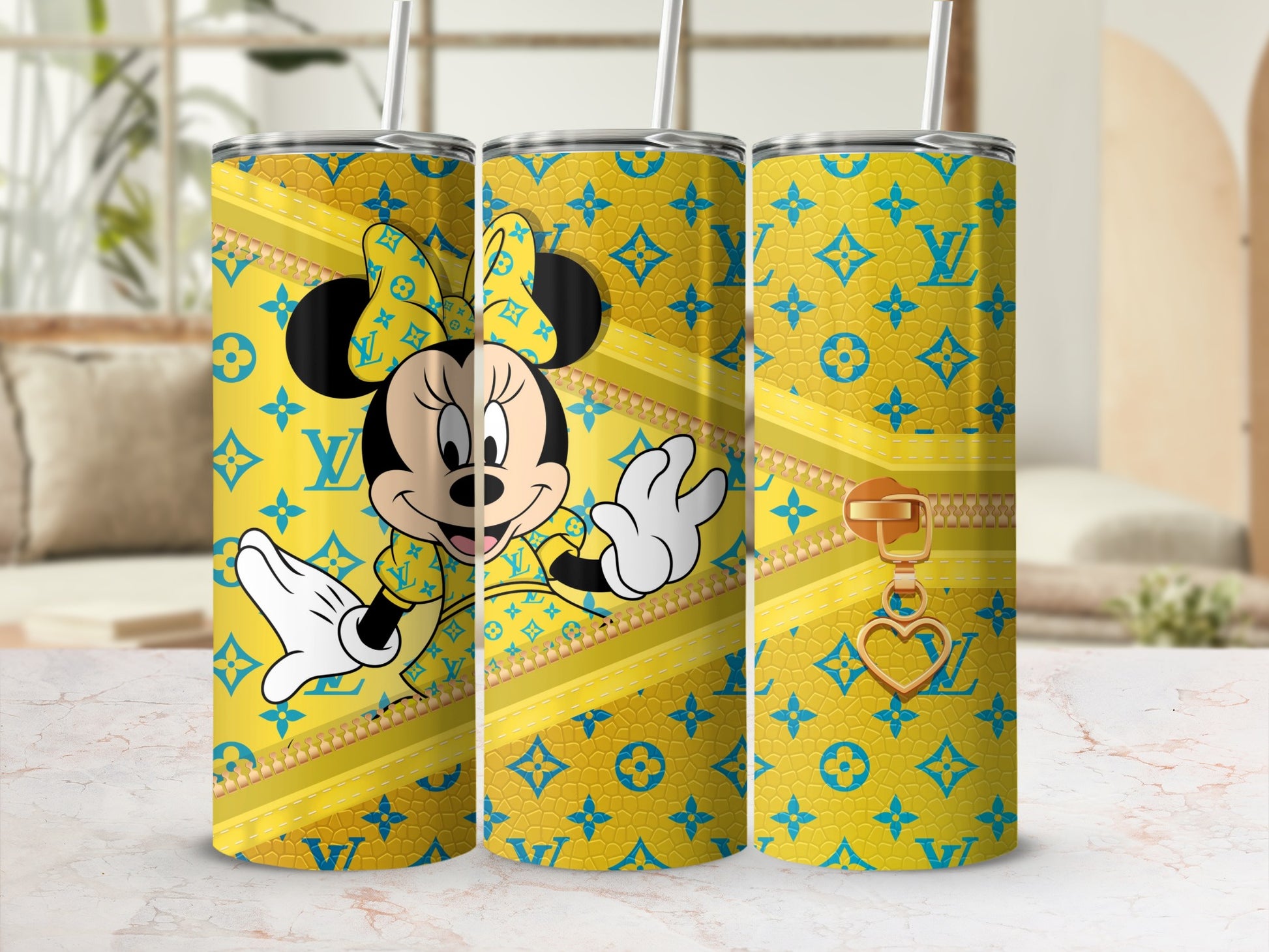 Minnie Mouse and LV pattern on a yellow tumbler with straw.