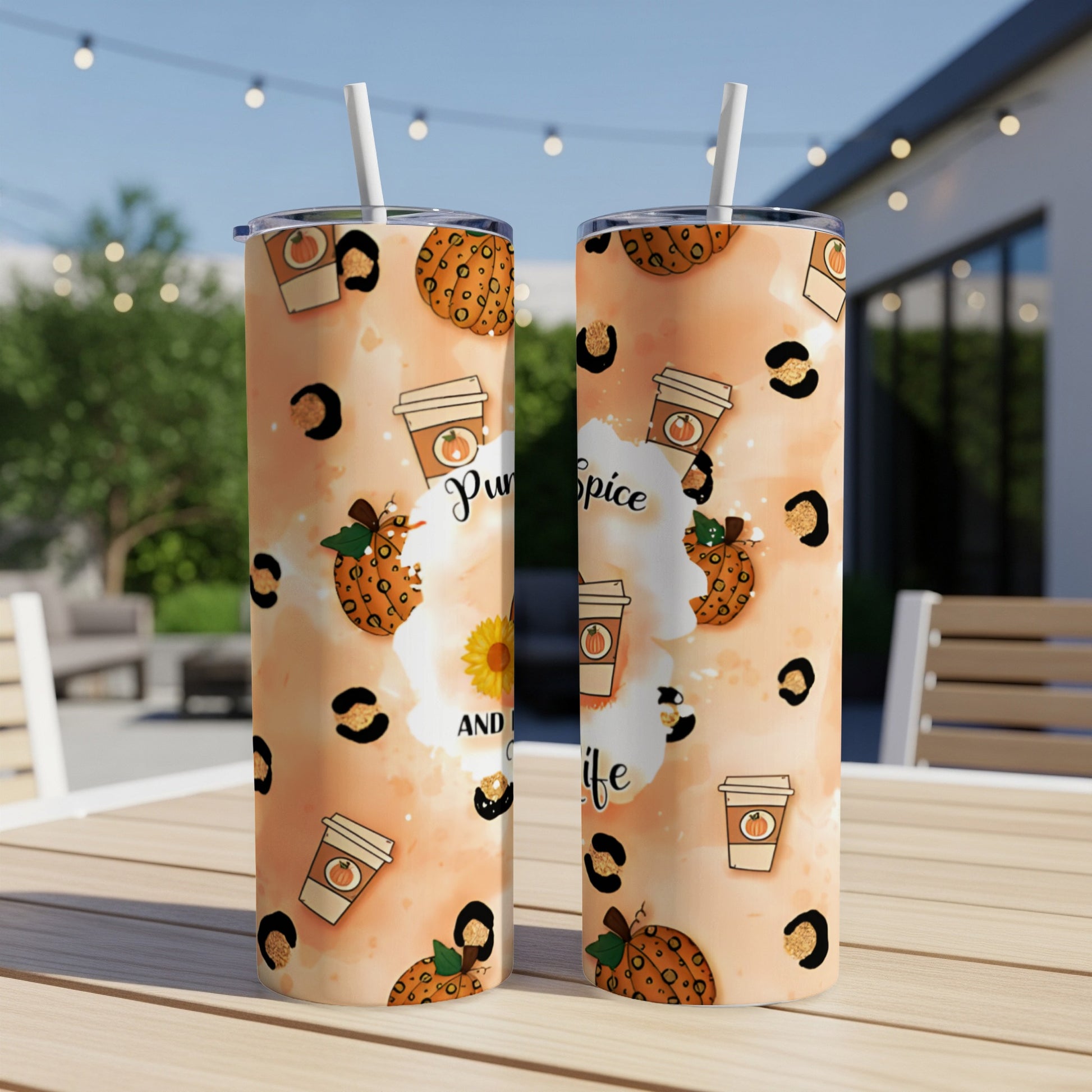 Two tall tumblers with pumpkin spice and leopard print design.