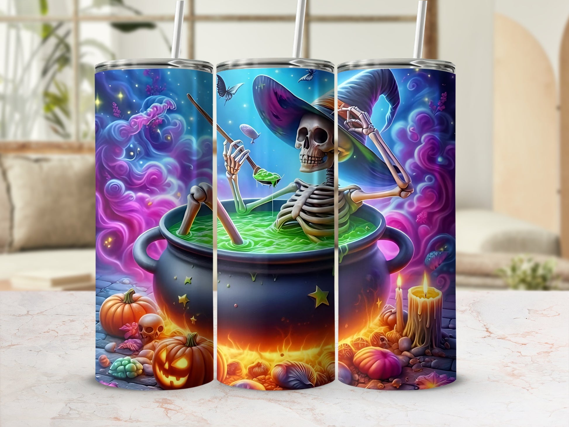 Halloween skinny tumbler with skeleton witch in cauldron and pumpkins.