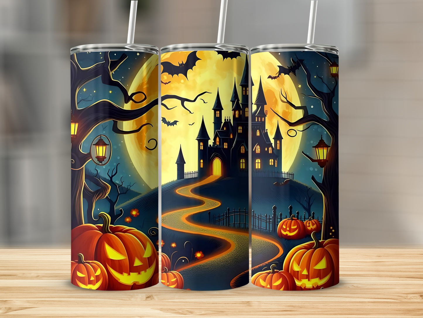 Halloween tumblers with spooky castle, pumpkins, bats, and a full moon.