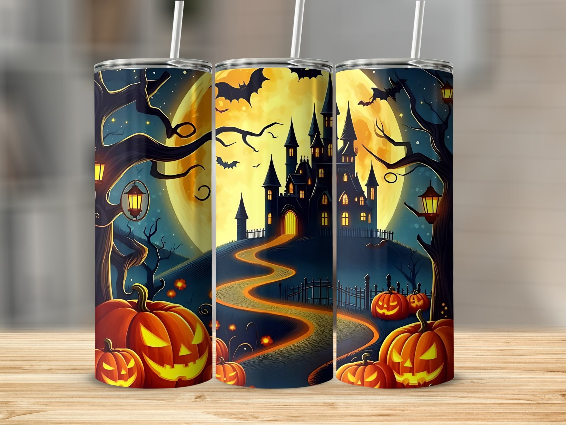 Halloween tumblers with spooky castle, pumpkins, bats, and a full moon.