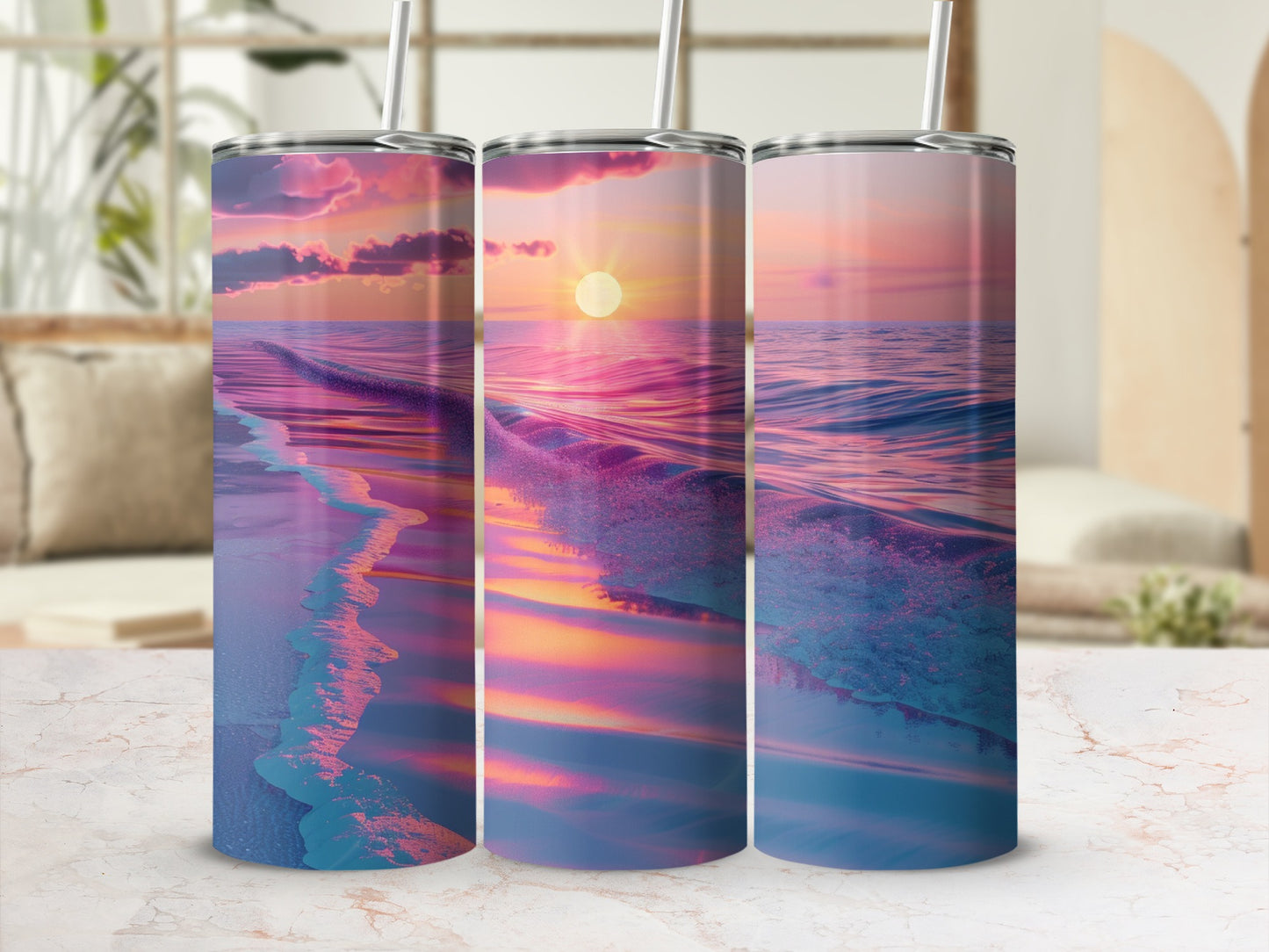 Three tumblers with sunset ocean waves design.