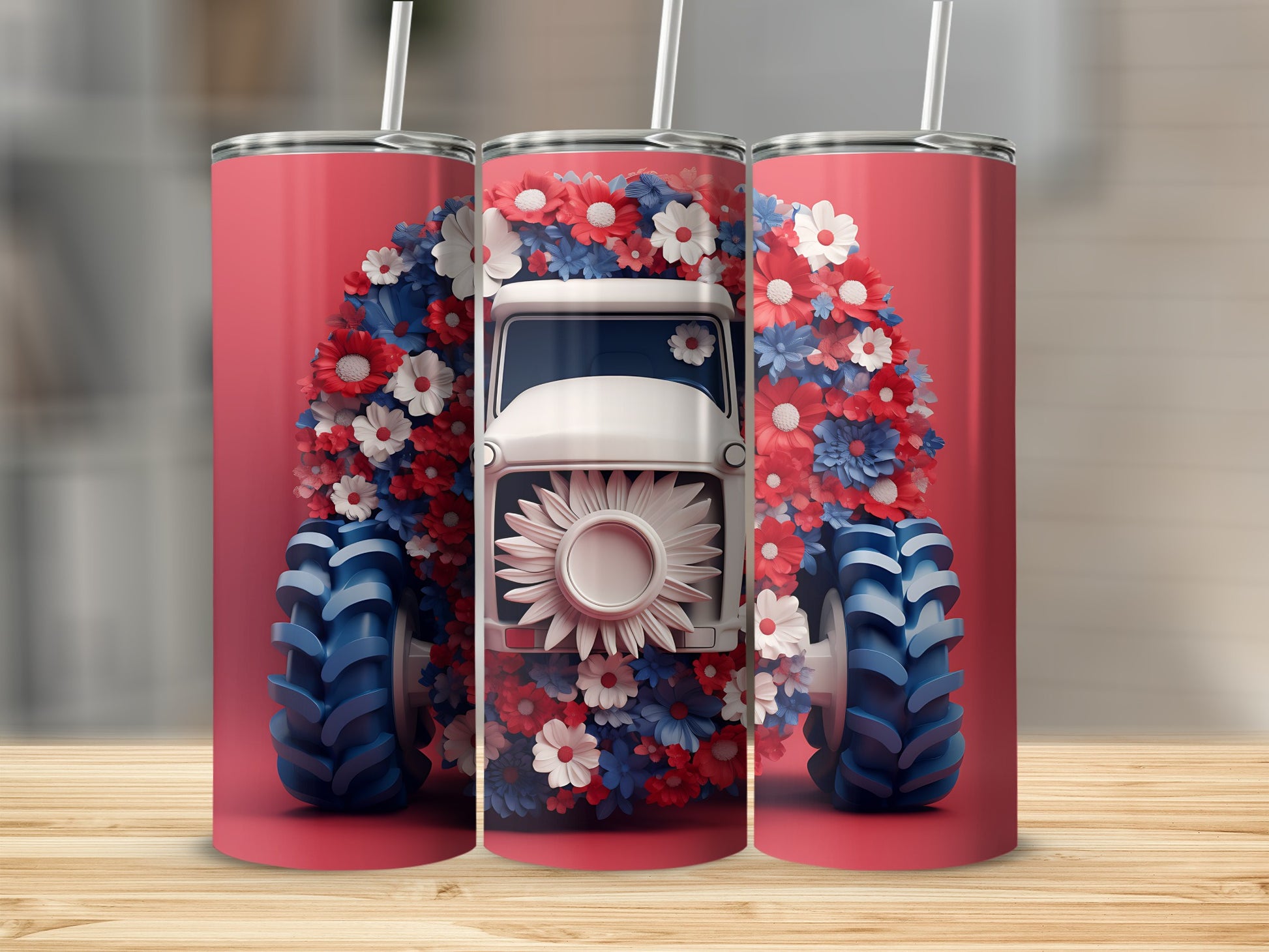 Tractor with floral wreath on three stainless steel tumblers.