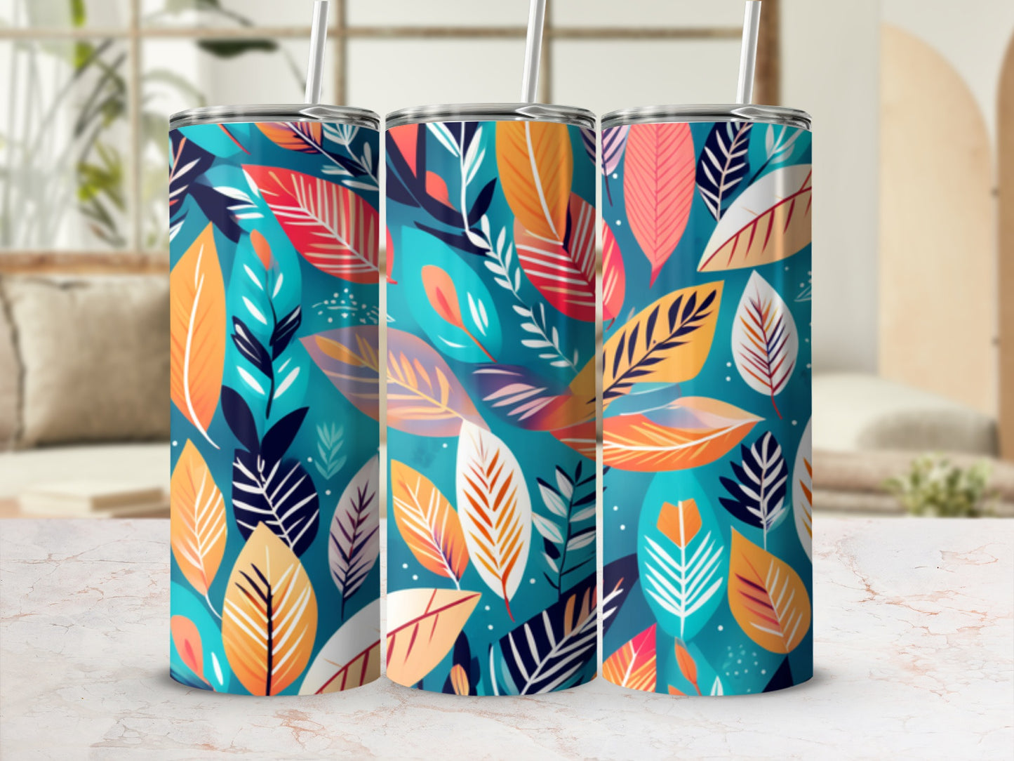 Three tumblers with a colorful abstract leaf pattern.