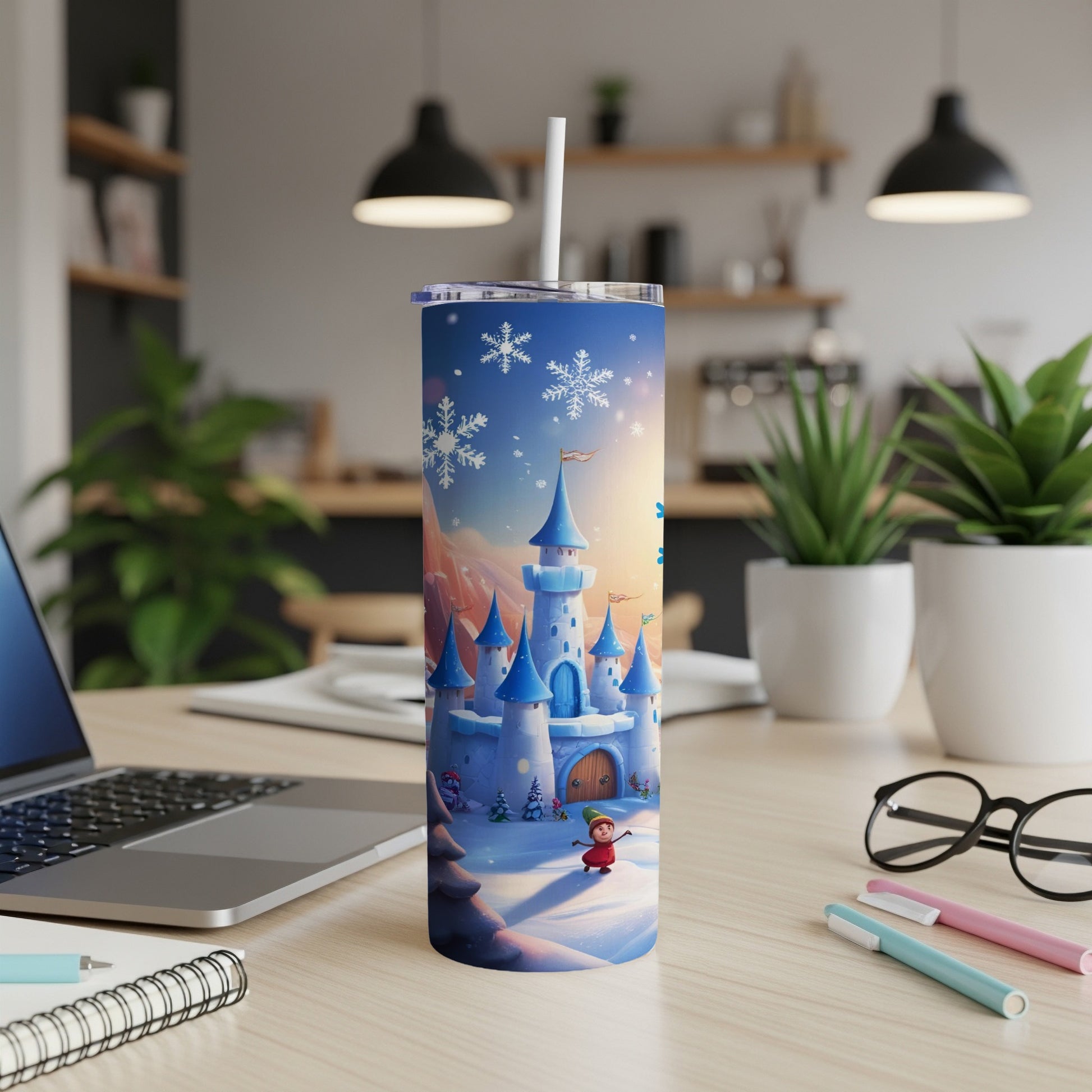 Winter castle design on a white tumbler with straw.