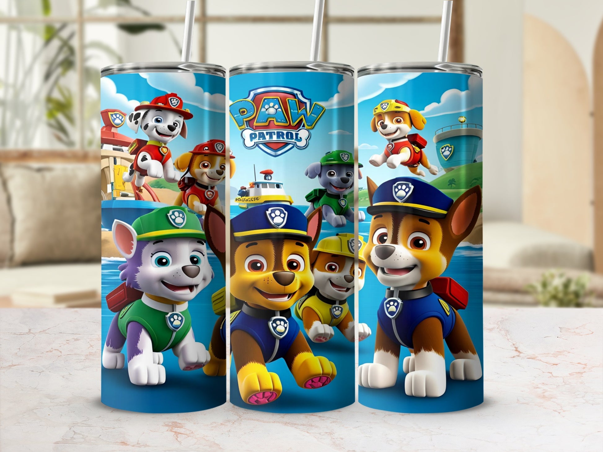 Paw Patrol characters on blue tumblers with straws, featuring Chase, Marshall, and Skye.