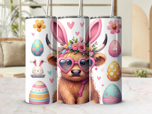 Three tumblers featuring Easter highland cows and decorated eggs.