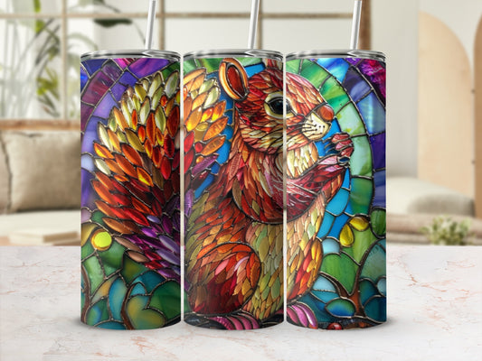 Three tumblers featuring a colorful stained-glass squirrel design.