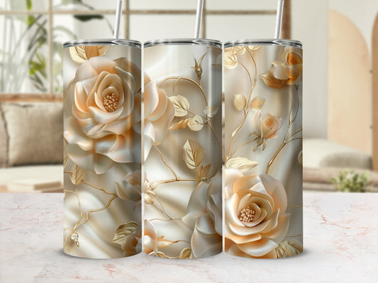 Gold floral pattern on three seamless tumblers with straws.