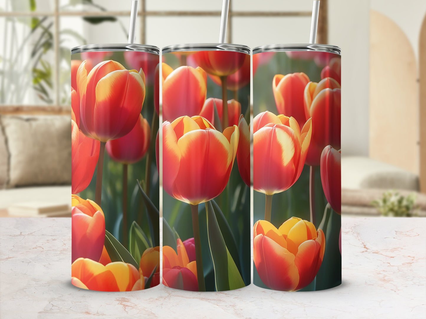 Three tumblers with a vibrant red and yellow tulip floral pattern.