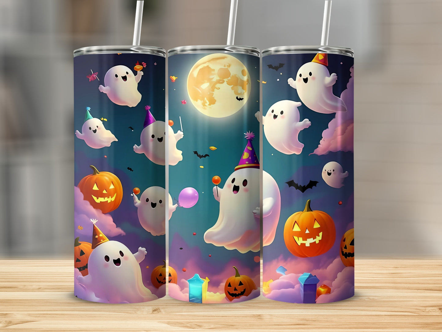 Halloween tumblers with ghosts, pumpkins, and moon design.