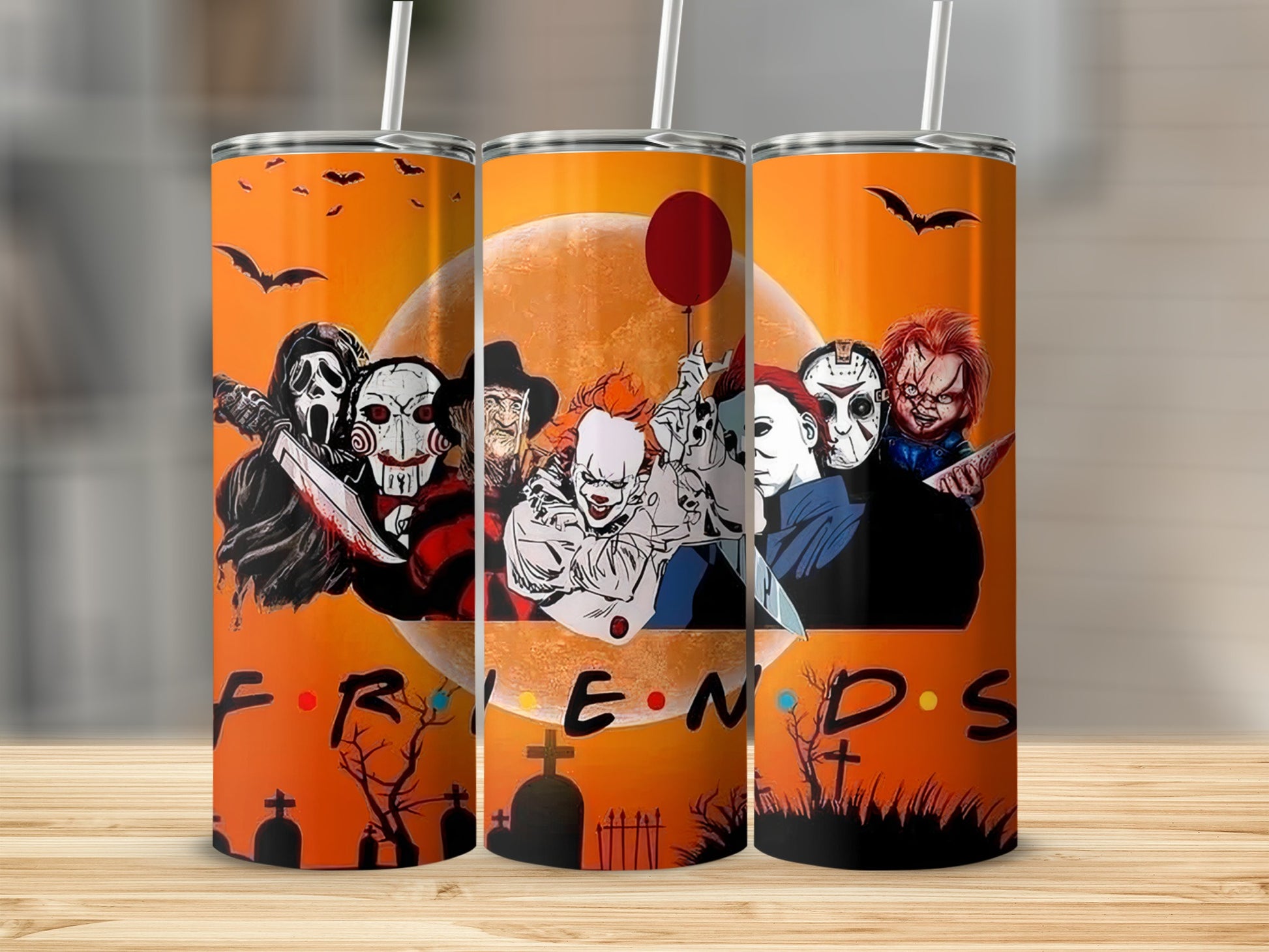 Horror movie villains pictured on a Halloween-themed tumbler with "Friends" text.