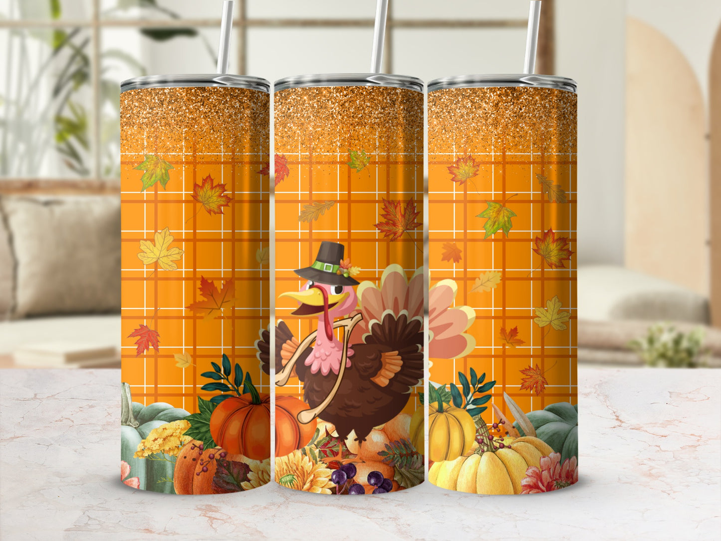 Three tumblers with a turkey, pumpkins, and fall leaves design.