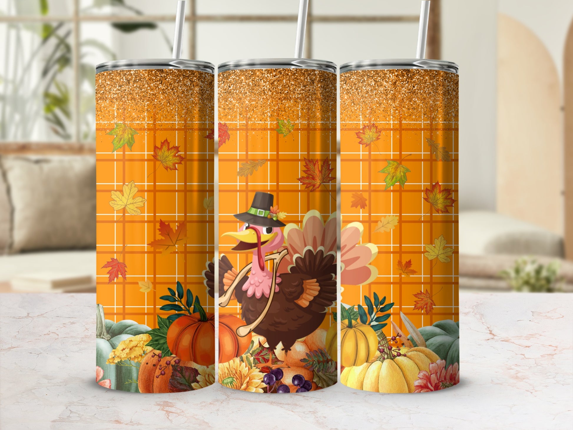 Three tumblers with a turkey, pumpkins, and fall leaves design.