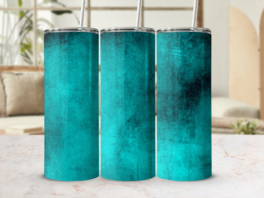 Three teal textured tumblers with silver lids and straws against a blurred background.