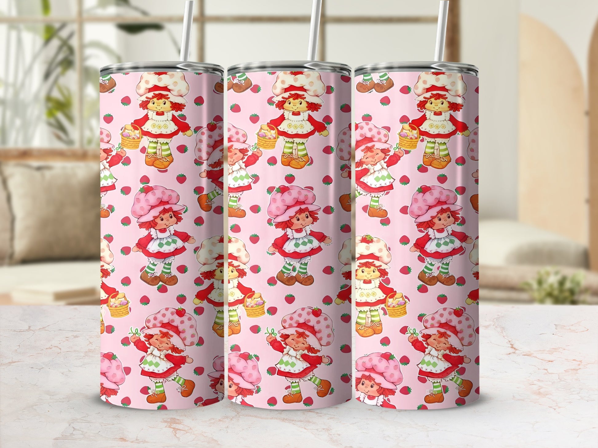 Pink tumbler with Strawberry Shortcake illustration and repeated pattern.