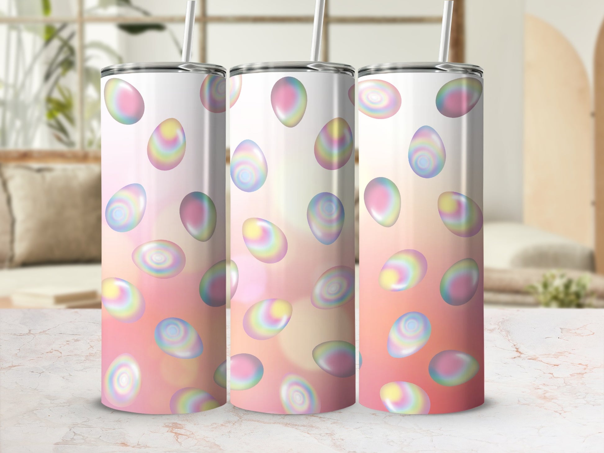 Three iridescent Easter egg tumblers with pastel watercolor background.