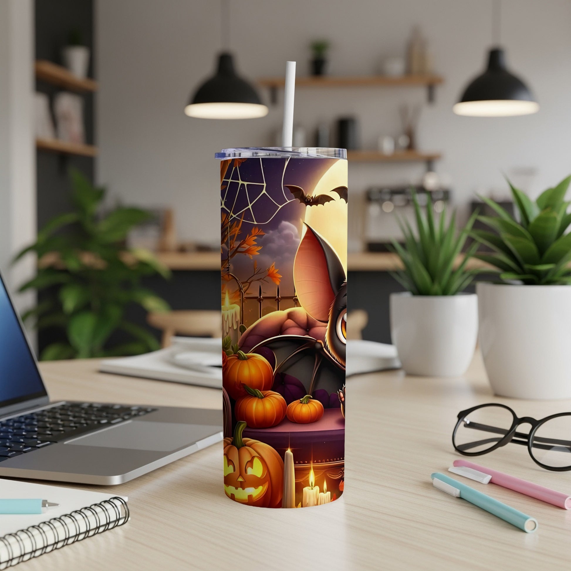Halloween tumbler with cute bat, pumpkins, spiderweb, and full moon design.
