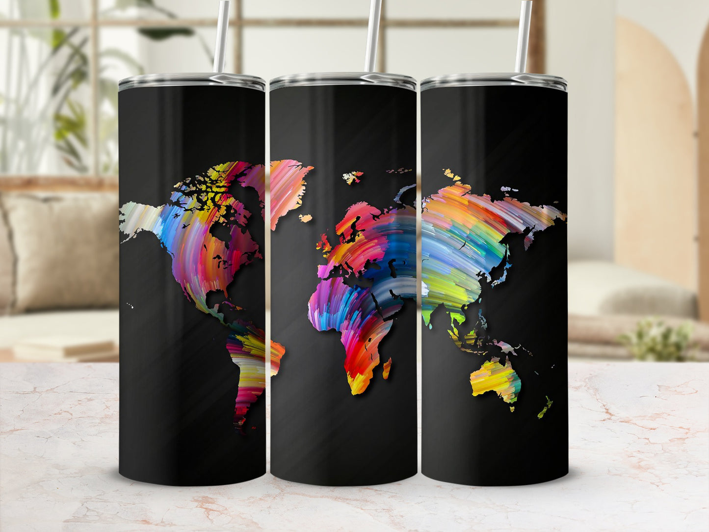 Three tumblers with a colorful world map design on a black background.