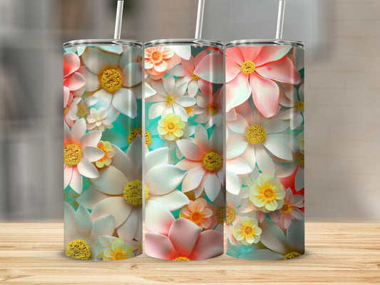Three tumblers with a floral design featuring white and pink flowers.