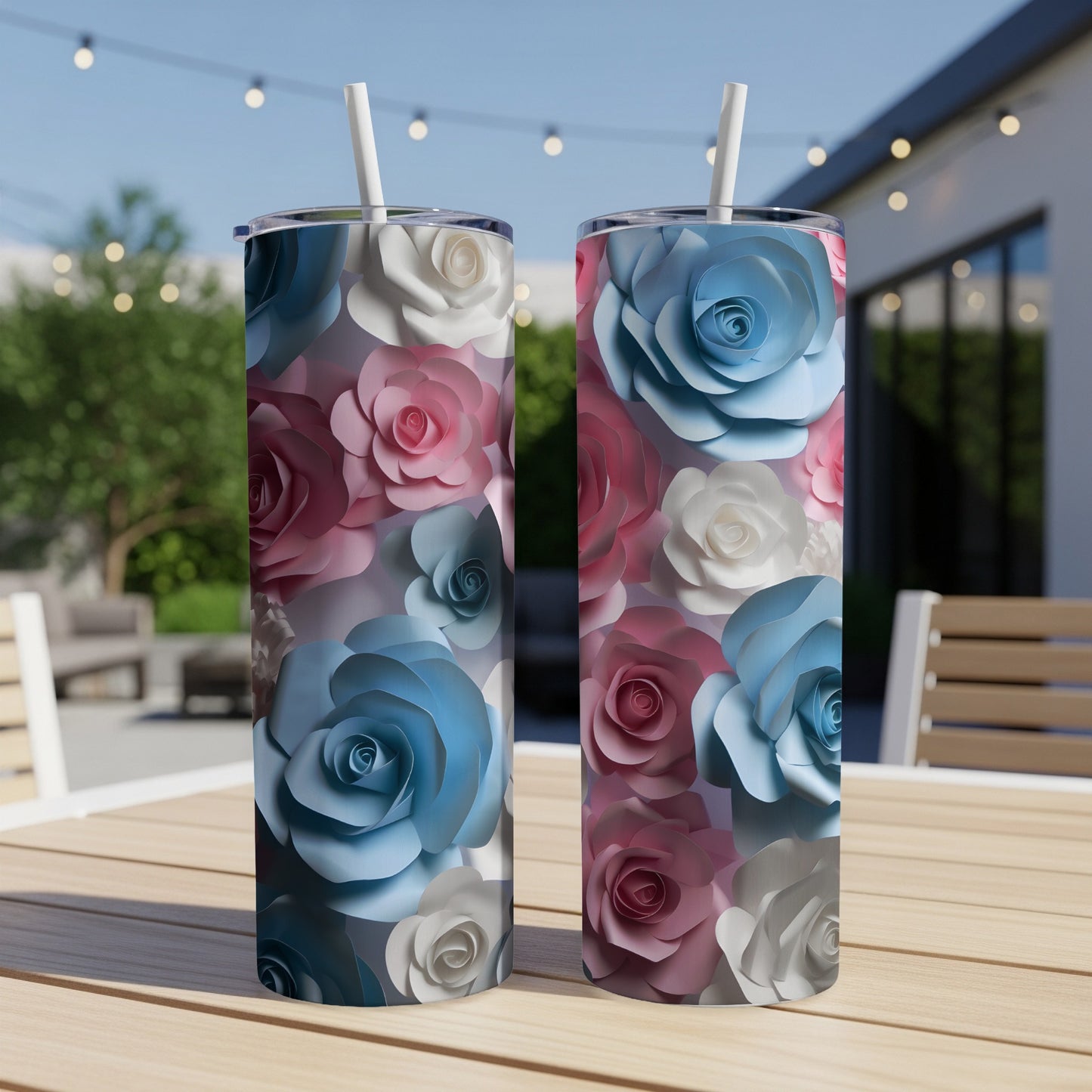 Two tumblers with pastel rose floral patterns, one blue-toned, one pink-toned.
