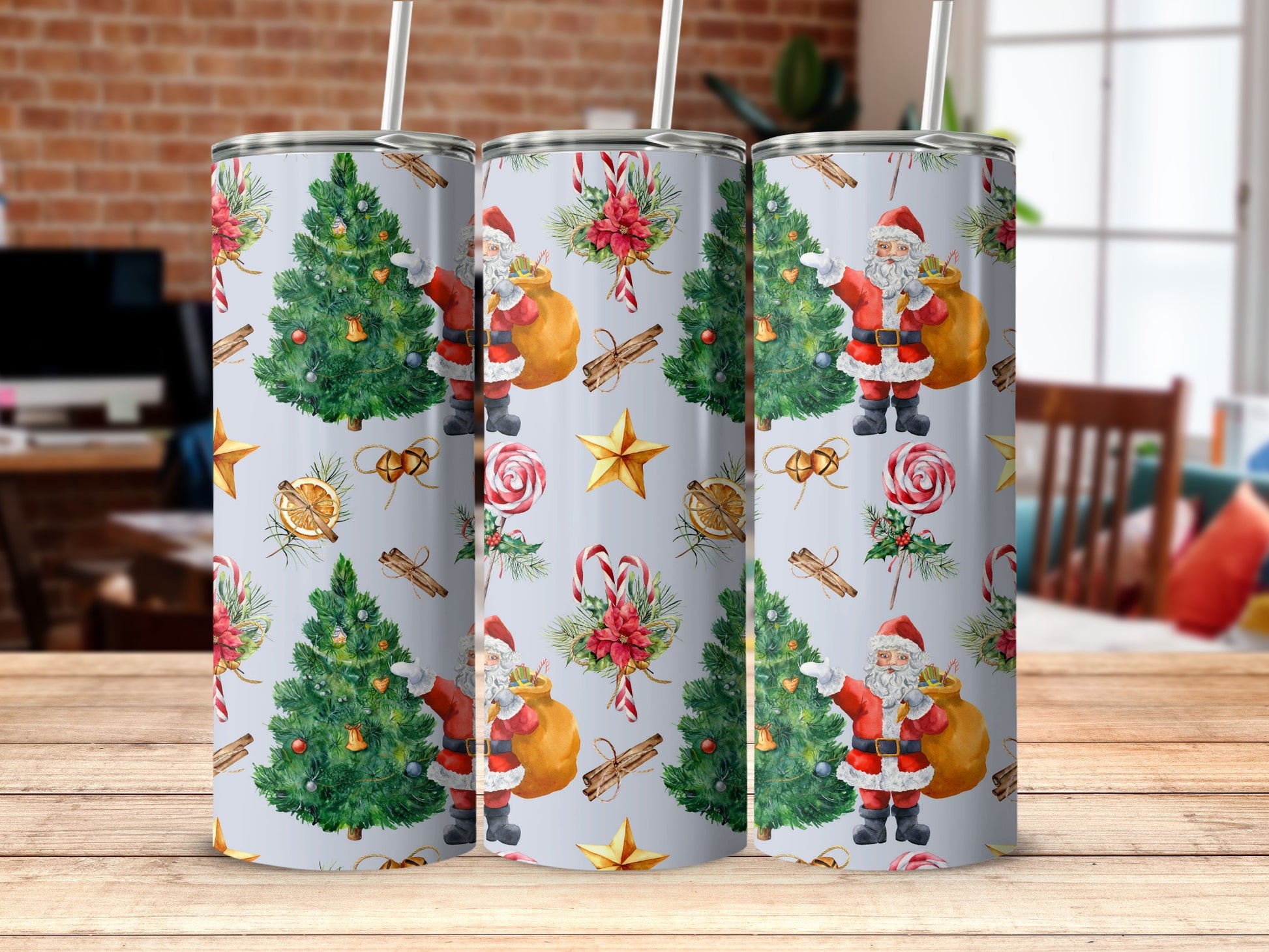 Santa Claus, Christmas trees, and candy canes pattern on three tumblers.