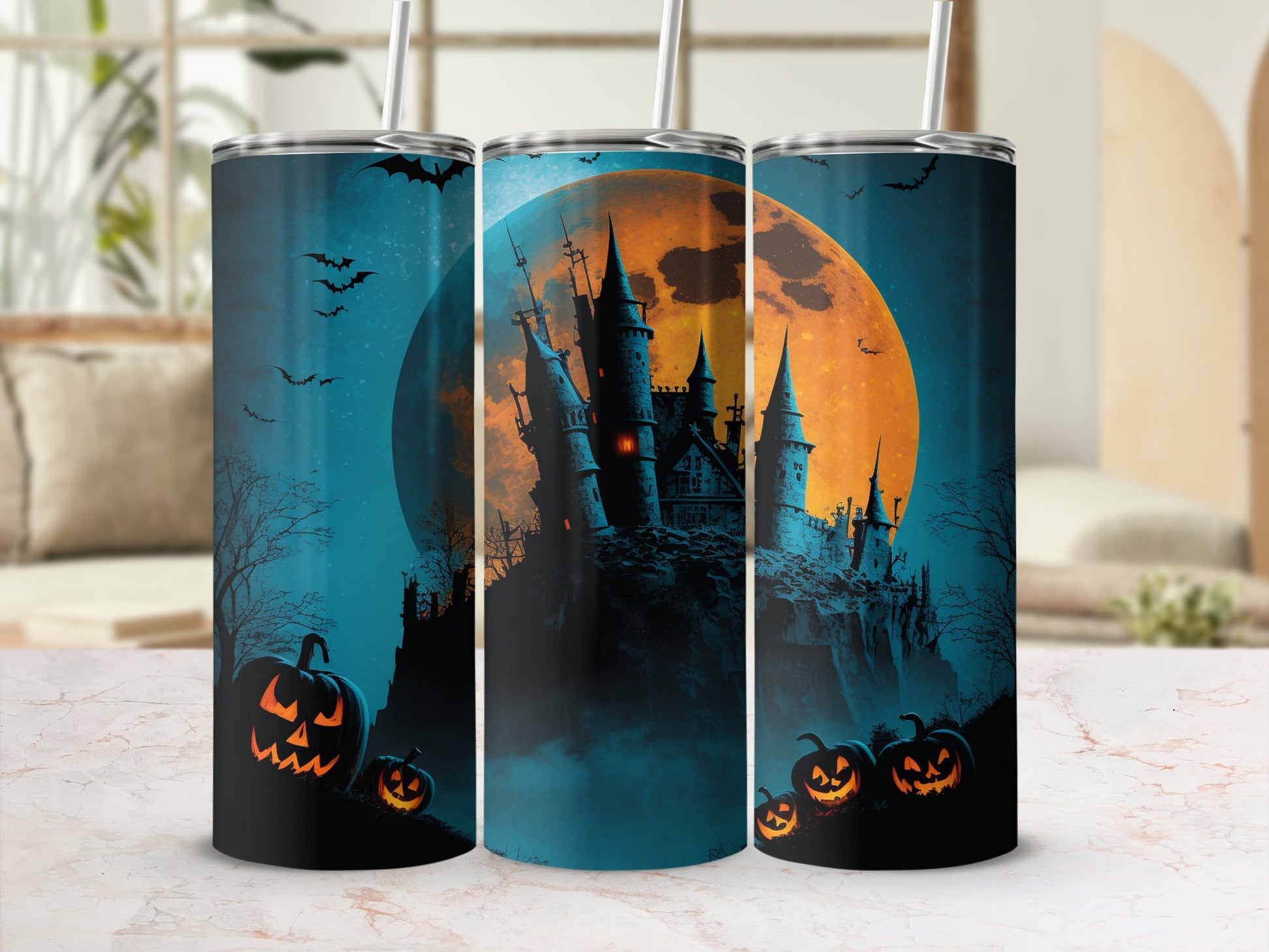 Halloween themed tumblers with spooky castle, bats, and jack-o'-lanterns on a dark background.