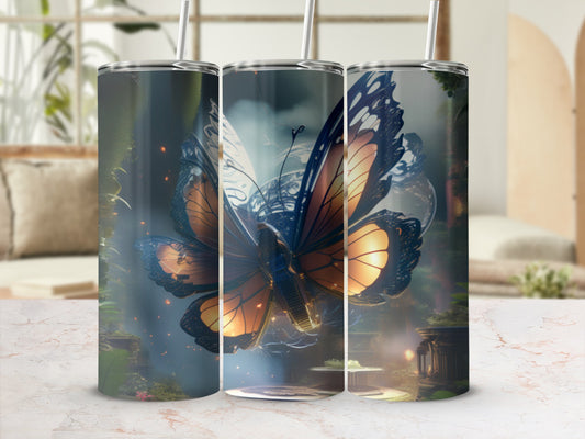 Tall tumbler with a large orange and black butterfly design against a misty, ornate background.