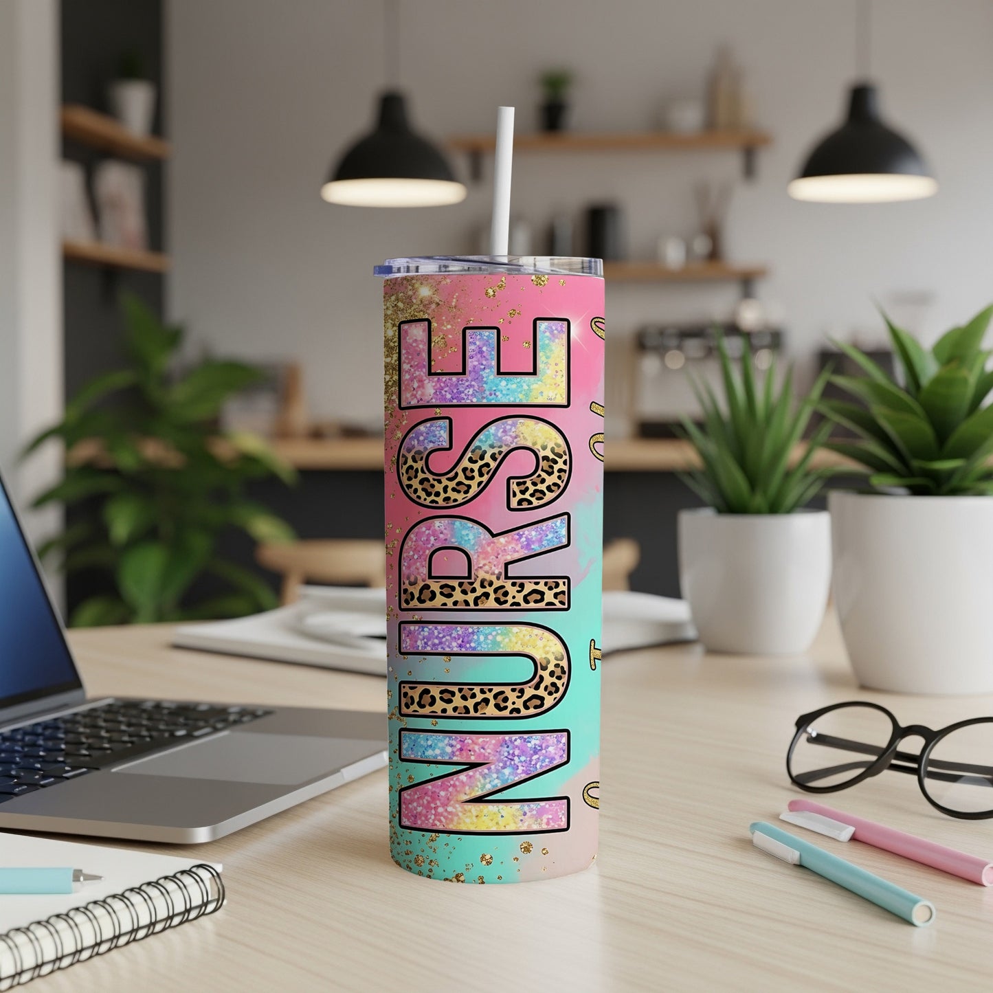 "Nurse" text on a colorful, glittery tumbler with a straw, on a desk.
