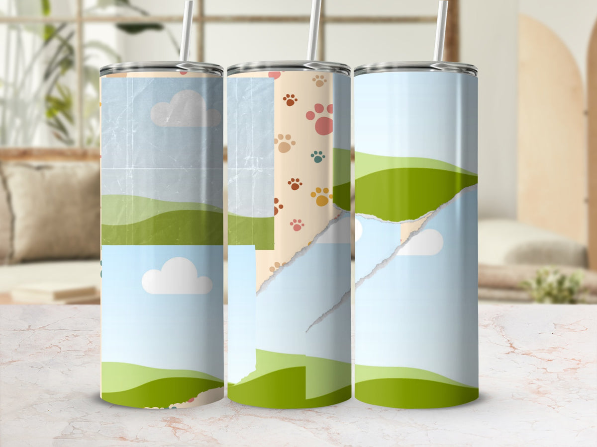 Three tumblers with a ripped paper collage of sky, clouds, hills, and paw prints.