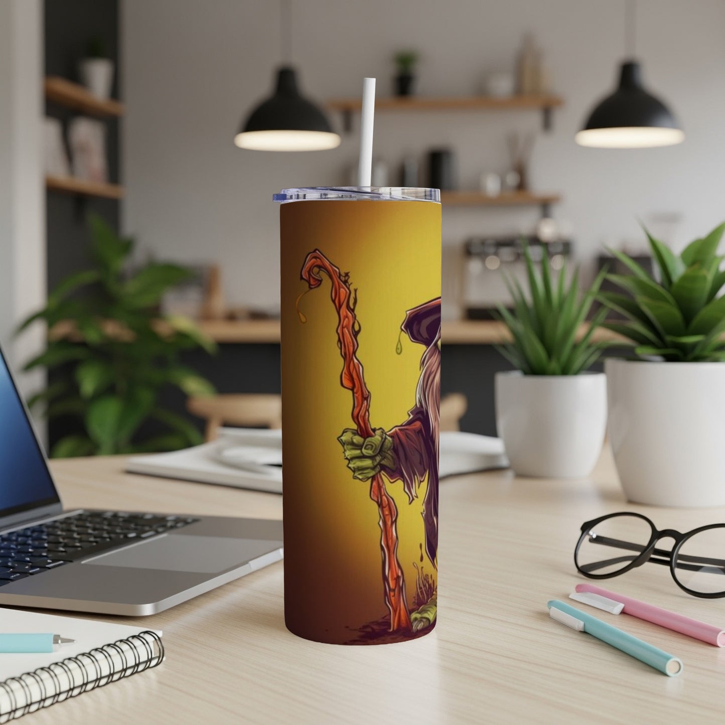 Tall tumbler with a witch illustration, holding a crooked staff on a yellow background.