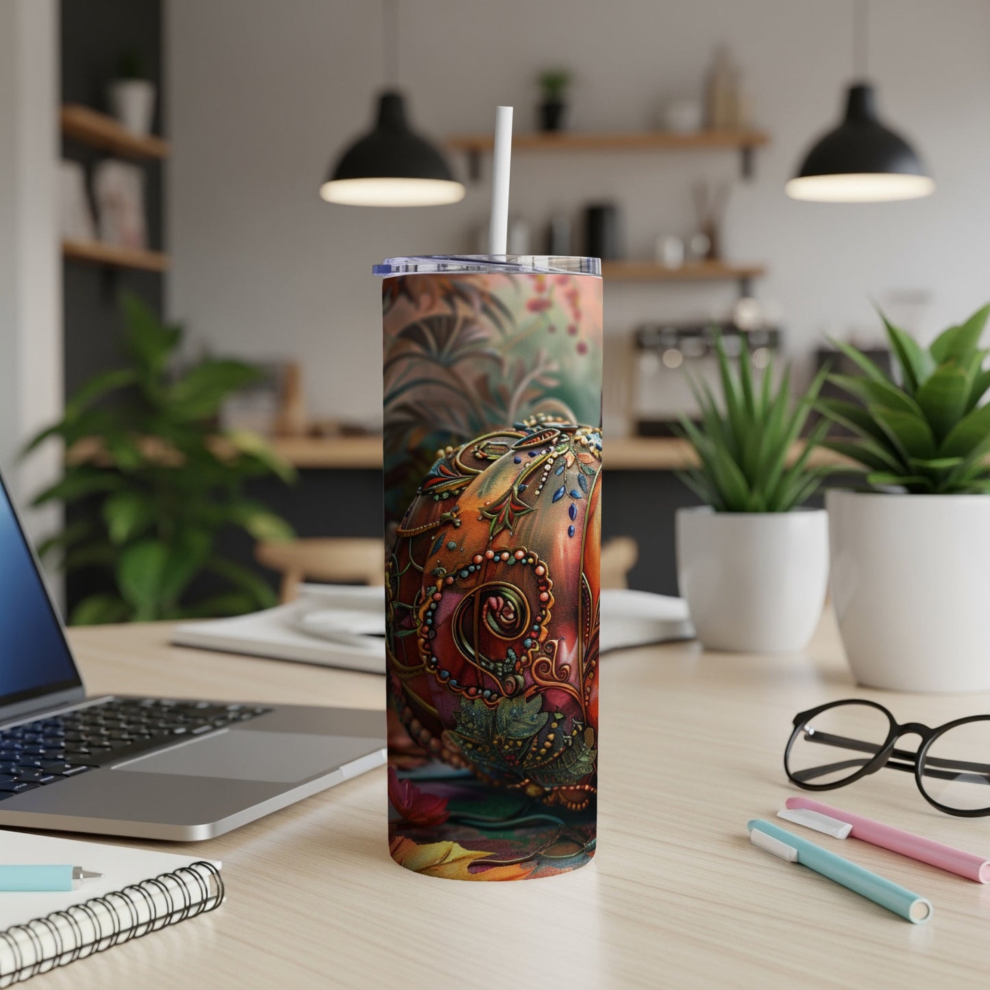 Tumbler with intricate autumn pumpkin design and colorful leaves.