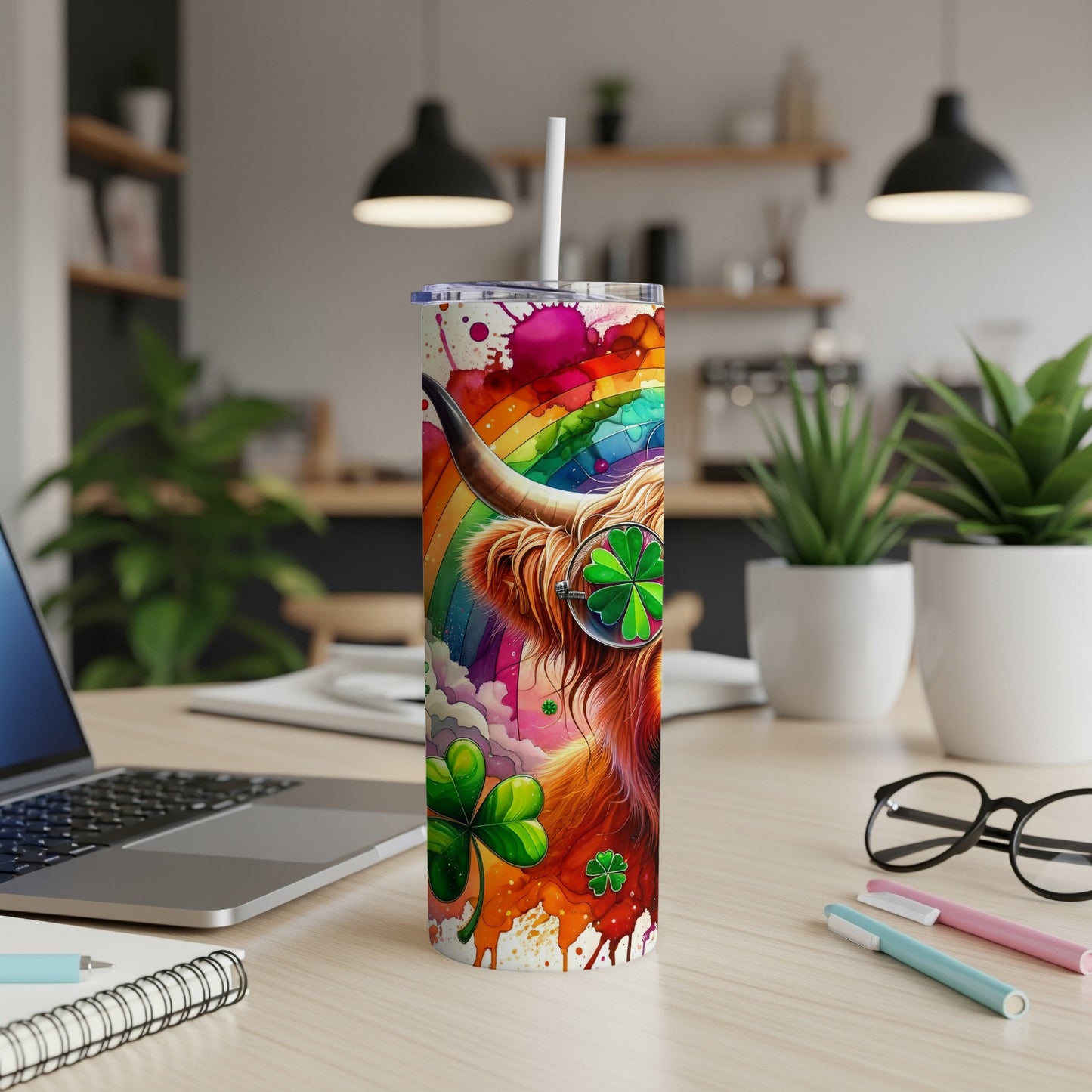 Highland cow with rainbow mane, shamrocks, and clover-shaped glasses on tumbler.
