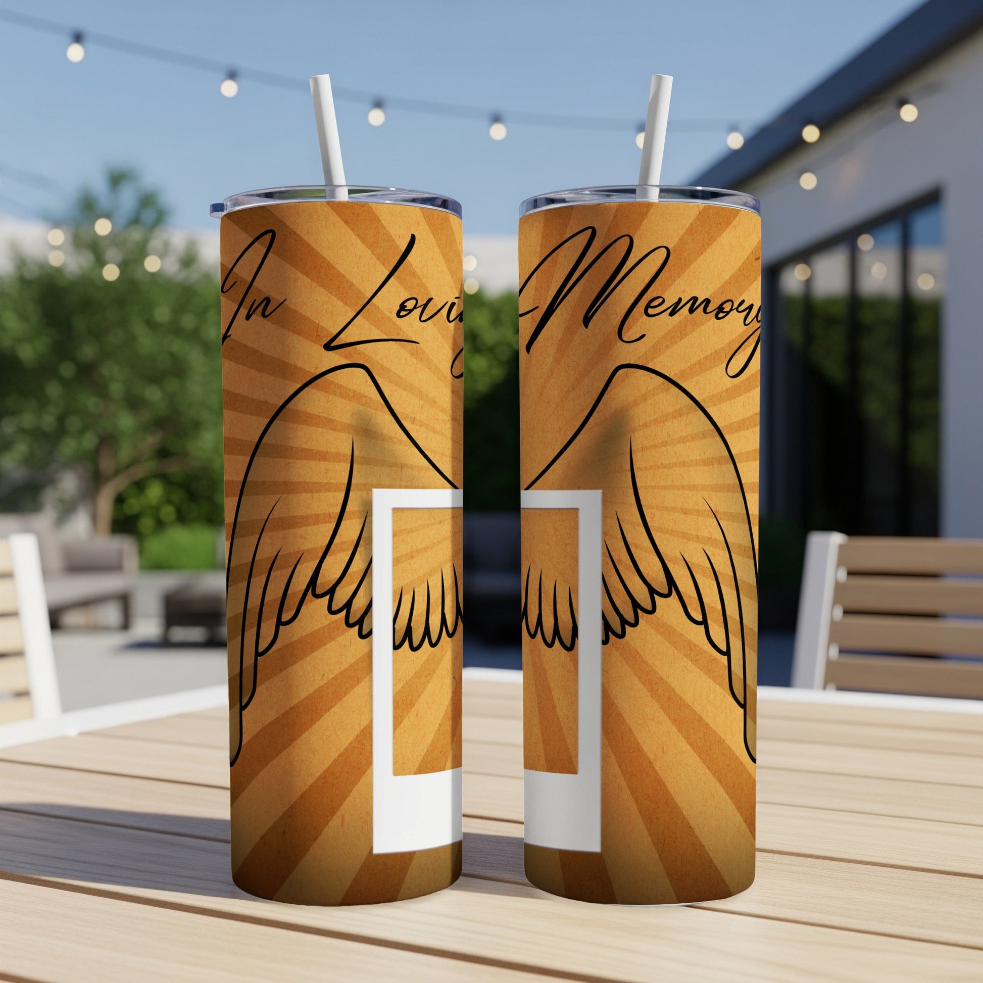 Two tumblers with "In Loving Memory" text, angel wings, and a sunburst pattern.