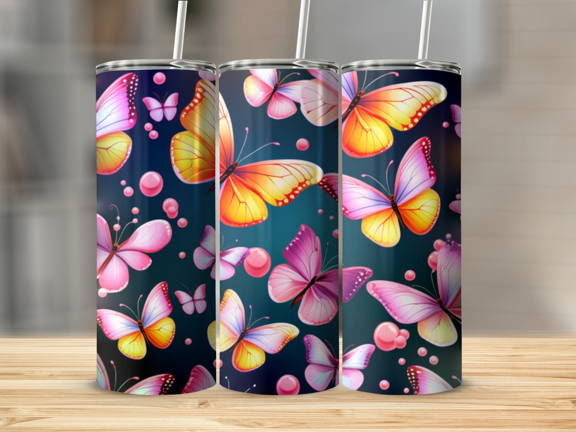 Tumbler with colorful butterflies and pink dots.