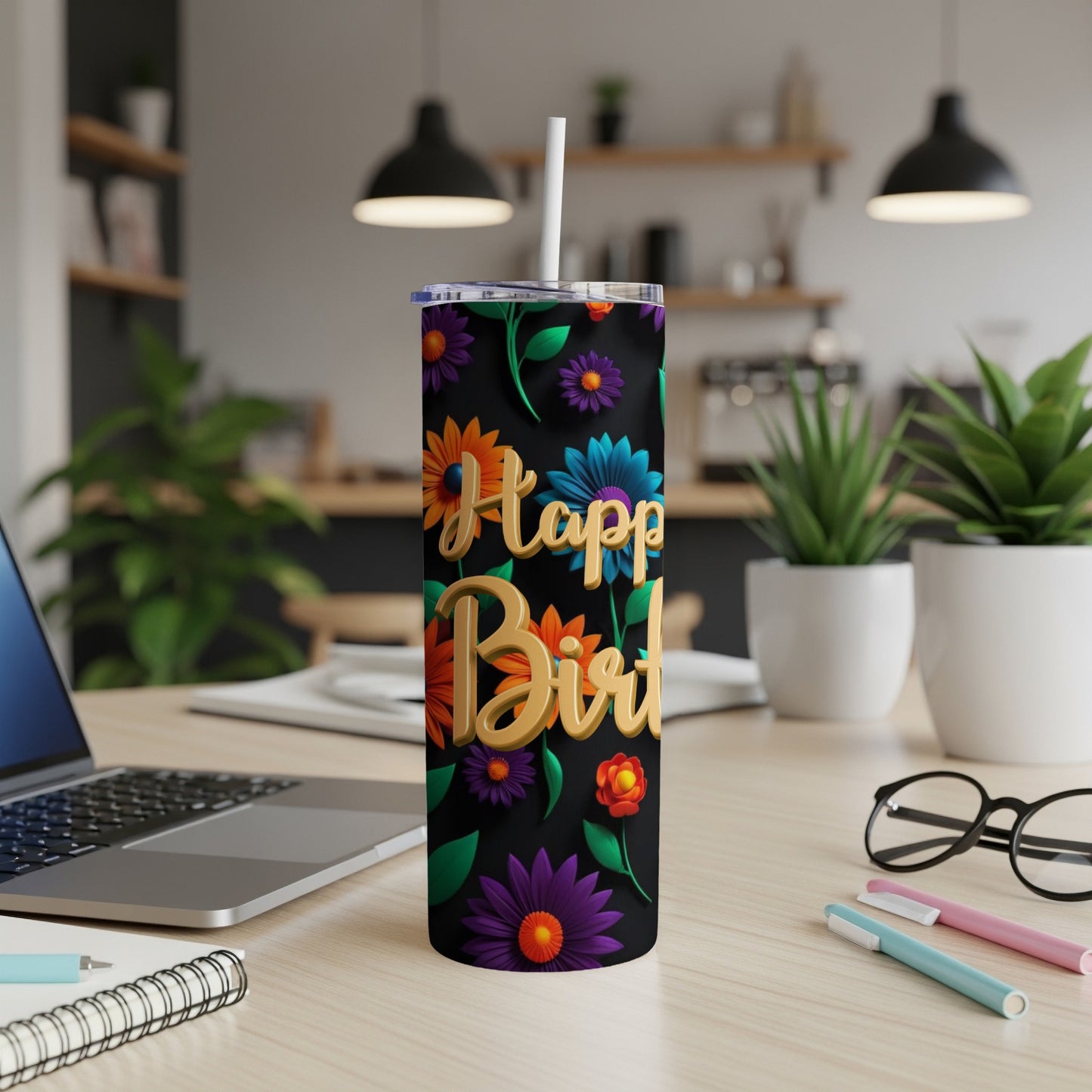 Black tumbler with "Happy Birthday" text and colorful floral pattern.