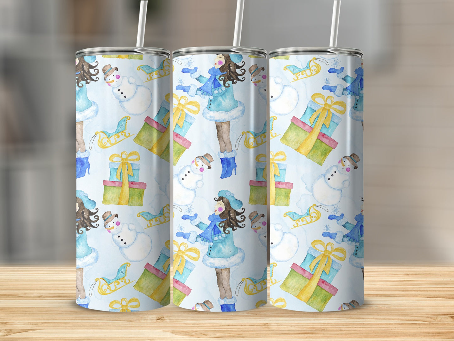 Tumbler with a winter holiday pattern of snowmen, girls in blue, and presents.