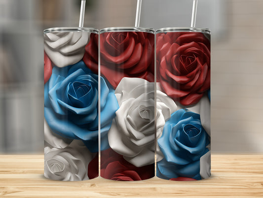 Tumbling red, white, and blue roses on a stainless steel tumbler.